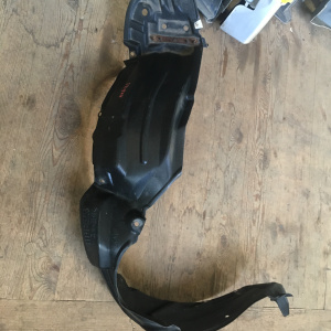 Подкрылок Toyota Corolla Fielder NKE165 перед, лев 53806-12070  53876-12550