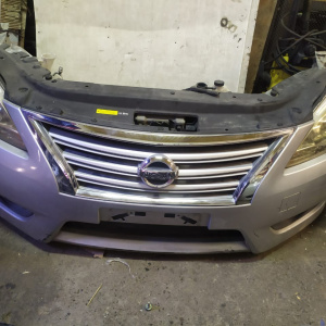 Ноускат Nissan Sylphy B17 MRA8 '2012-2020 Без трубок охлаждения Дефект R фары + бачок омывателя+адсорбер ф.W0613 xenon тум.A061715