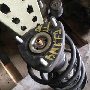 Стойка Mazda BM6FJ Axela перед, прав