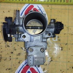 Заслонка дроссельная Toyota 3S-FE/4S-FE Ipsum ST190/SV40/ST200/ST210/SXM10/SXA10 22210-7A560 3 болта ( кат. ) ПРОБЕГ 52 т. км.