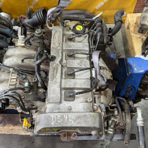 Двигатель Mazda FP-490650 2WD КАТУШКИ С БОКУ  без генератора Capella