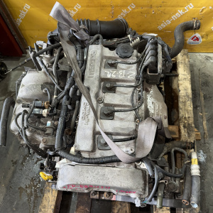 Двигатель Mazda FP-599434 2WD КАТУШКИ С БОКУ  без генератора Capella