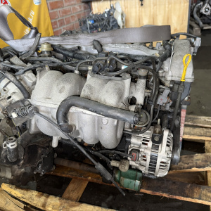 Двигатель Mazda FP-599434 2WD КАТУШКИ С БОКУ  без генератора Capella