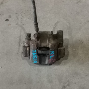 Суппорт Toyota ZNE14 Wish зад, лев