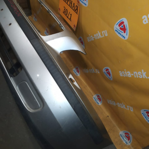 Бампер Volvo V70 SW '2000-2004 перед под омыватели фар 09484239/443