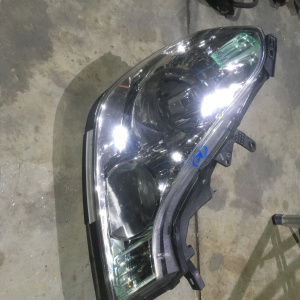 Фара NISSAN 1777 прав Wingroad Y12 дефект крепления