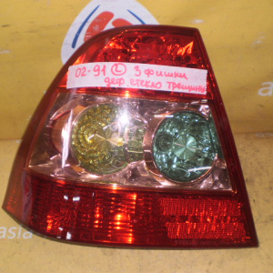 Стоп TOYOTA 02-91 L Corolla ZZE120 '2004-2007 Sedan Европа (3 фишки) Дефект стекла (трещины)