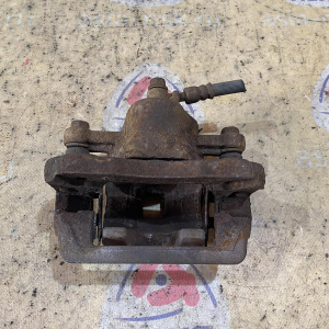 Суппорт Kia KM/JE/FQ Sportage зад, прав 582302E000 '2005