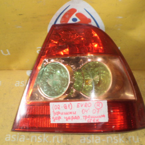 Стоп TOYOTA 02-91  (81551-02260) R Corolla ZZE120 '2004-2007 Sedan Европа (3 фишки) Дефект стекла (царапины+трещины)