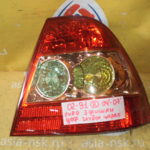 Стоп TOYOTA 02-91  (81551-02260) R Corolla ZZE120 '2004-2007 Sedan Европа (3 фишки) Дефект стекла (глубокие царапины)