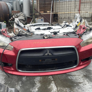 Ноускат Mitsubishi Galant Fortis/Lancer CX3A дефект правой фары ф. P8597 xenon тум.047436