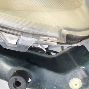 Ноускат Toyota Vitz NCP15 1NZ '1999-2001 a/t (CLAVIA) дефект крепления R фары ф.52-001