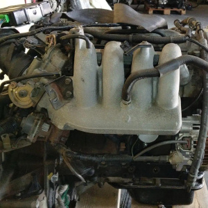 Двигатель Mazda FP-431476 2WD Capella/Premacy GW8W катушки сбоку